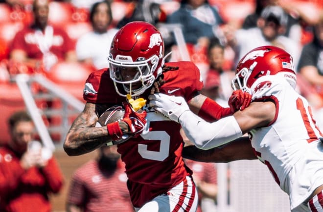 Arkansas wide receiver Tyrone Broden sheds a defender during the April 13 Red-White Spring Game at Razorback Stadium in Fayetteville.