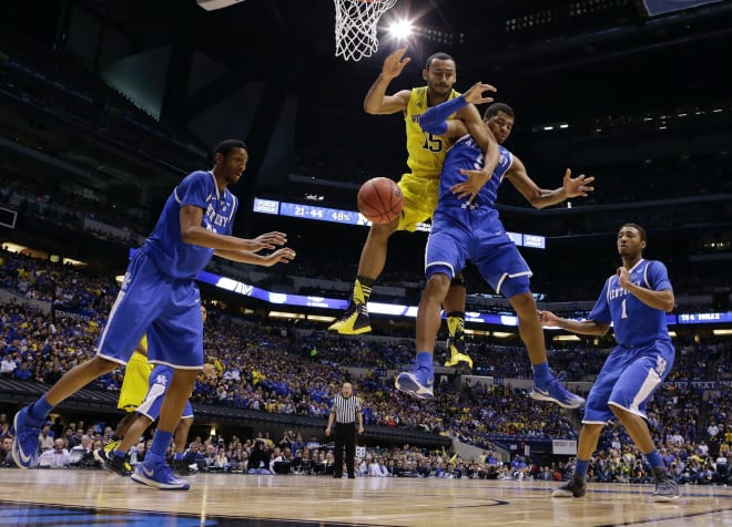 The Michigan Wolverines' basketball team won the Big Ten outright in 2014, before falling to Kentucky in the Elite Eight.