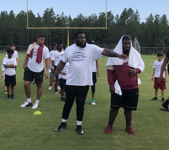Cleveland Brown defensive lineman Marvin Wilson was joined by FSU defensive tackle Robert Cooper and walk-on tight end Austin White at his youth camp.