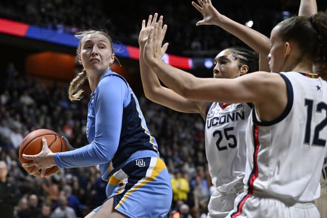 Marquette forward Liza Karlen (left) is headed to Notre Dame as a grad transfer.