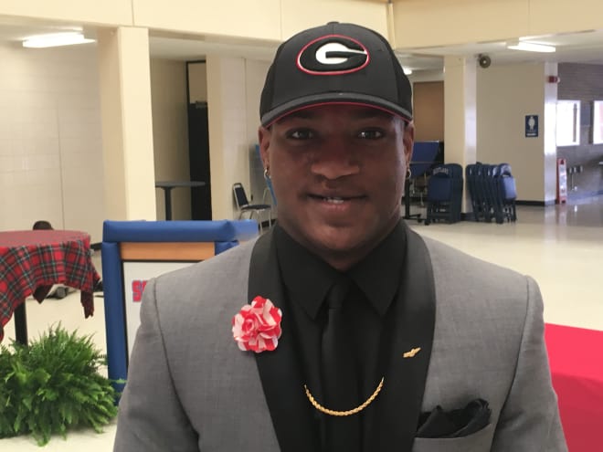 Zamir White ended his recruitment by slipping on a Georgia baseball cap.