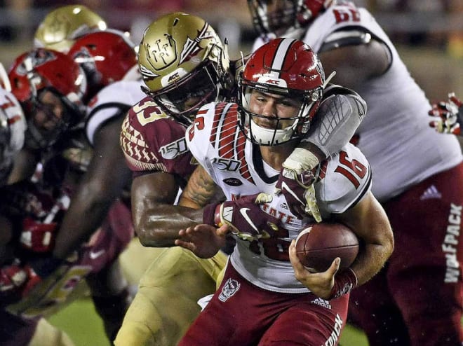 FSU linebacker Amari Gainer makes a tackle against N.C. State.