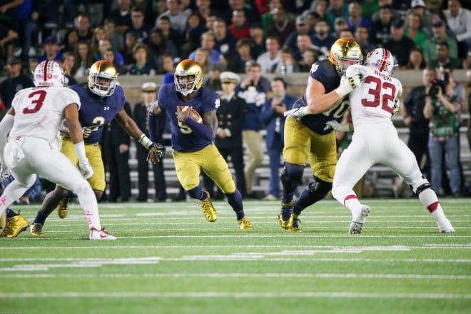 Malik Zaire finds room to run against Stanford.