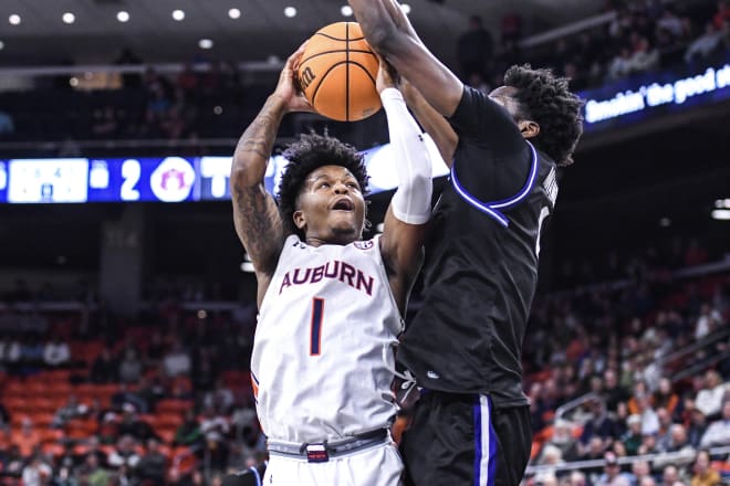 Wendell Green drives through contact