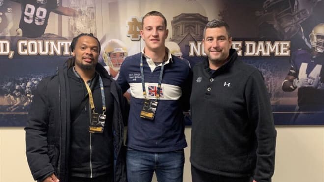 Alexander Ehrensberger (center) committed to Irish defensive line coach Mike Elston (right) and the Notre Dame program from his native Germany.