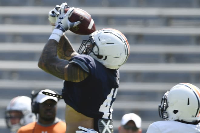 Wilson catches a pass in Wednesday's scrimmage.