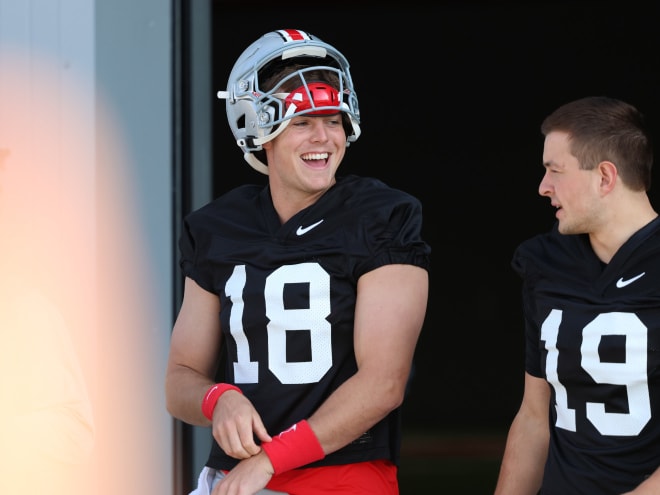 Ohio State starting quarterback Will Howard takes the field for an early camp practice. (Birm/DTE)