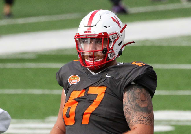 Former Nebraska offensive lineman Brenden Jaimes became the first Husker selected in the 2021 NFL Draft on Saturday.