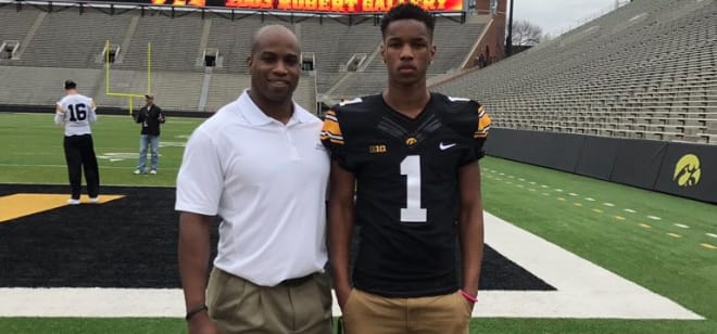 Class of 2019 prospect Maurice Massey with Iowa wide receivers coach Kelton Copeland.