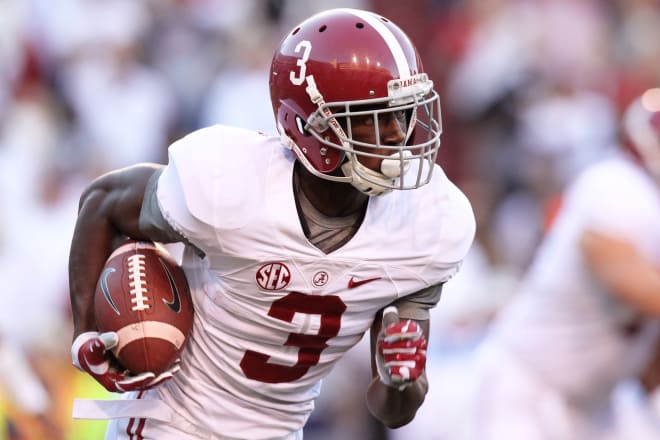 Alabama Crimson Tide wide receiver Calvin Ridley (3) rushes against the Arkansas Razorbacks during the first quarter at Donald W. Reynolds Razorback Stadium. Mandatory Credit: Nelson Chenault-USA TODAY Sports.