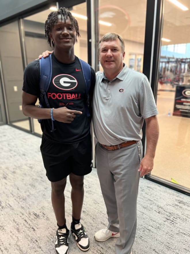 2024 linebacker Chris Cole with Georgia head coach Kirby Smart. Photo via Chris Cole's Twitter. 