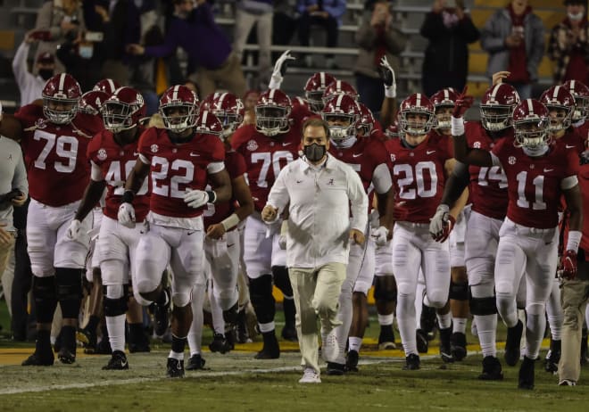 Alabama Crimson Tide head coach Nick Saban runs onto the field with his team prior to kickoff against the LSU Tigers at Tiger Stadium.. Photo | Imagn