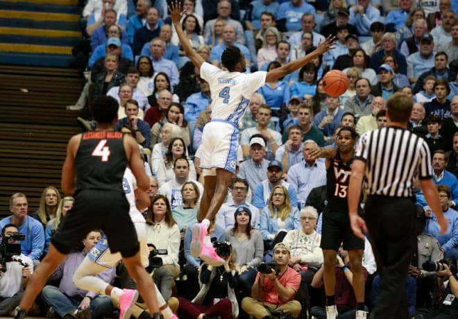 On either end of the floor, Roy Williams says he can count on Robinson.