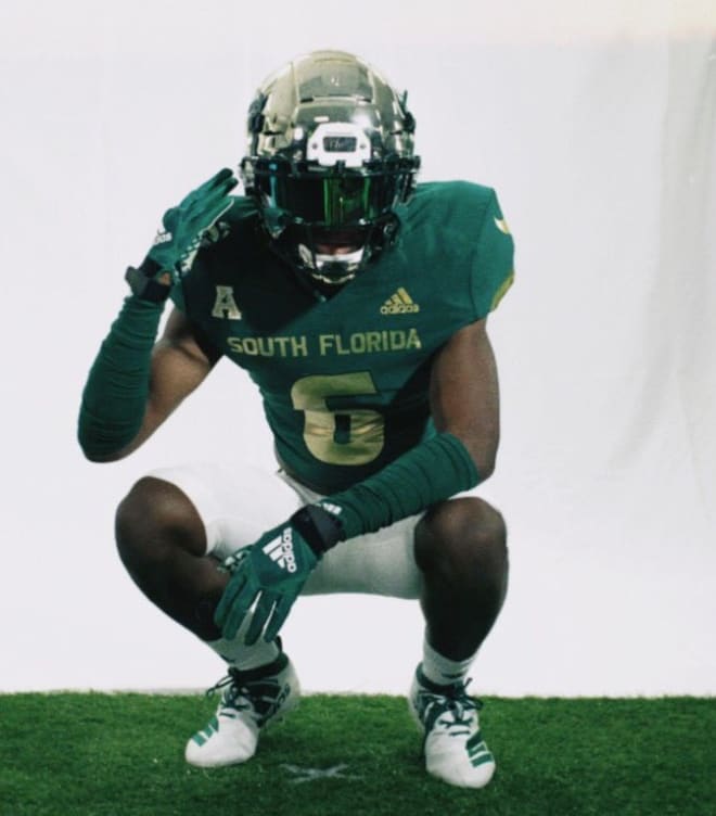 Snyder poses during his USF visit in February 