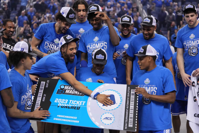 Duke players celebrate after winning the ACC championship on Saturday night. 