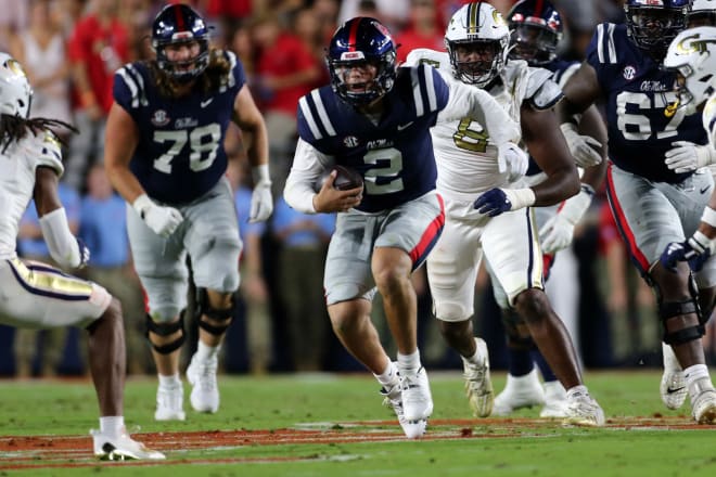 Ole Miss Rebels quarterback Jaxson Dart (2) runs the ball for a first down during the first half against the Georgia Tech Yellow Jackets at Vaught-Hemingway Stadium. Mandatory Credit: Petre Thomas-USA TODAY Sports