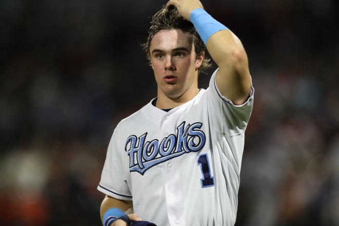 Hooks' Drew Gilbert walks back to the dugout at the end of an inning on Tuesday, May 16, 2023, at Whataburger Field in Corpus Christi, Texas.