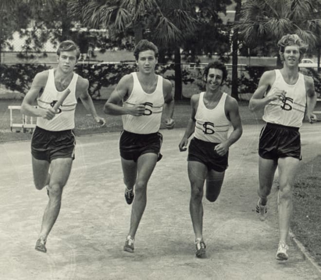 Bernie Waxman (second from right) was a captain on the FSU track team before embarking on a career with the university.