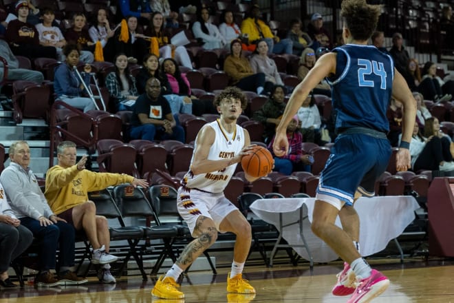 Central Michigan Chippewas forward Aidan Rubio (13) prepares to shoot the ball against a Northwood defender at McGuirk Arena.