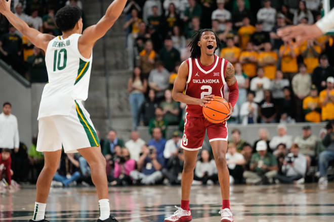 Javian McCollum (2) controls the ball