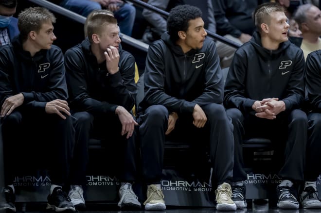 Purdue's Brian Waddell (far left) and Trey Kaufman-Renn (middle right)