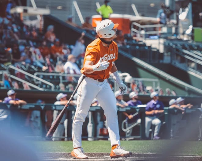 Ivan Melendez admires his second homer of the game. (@TexasBaseball)