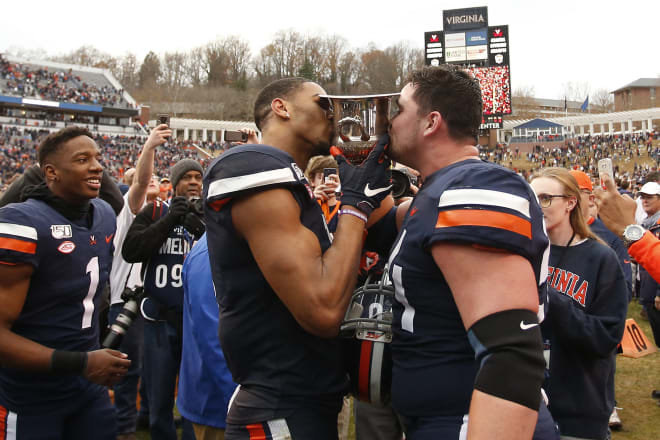 Charles Snowden and Ryan Nelson celebrate UVa's first Commonwealth Cup victory in 15 years following the Wahoos' 2019 win against Virginia Tech.
