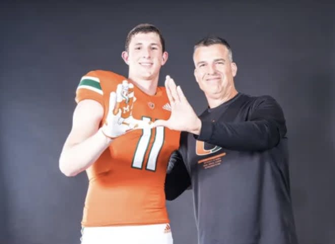 Carver with Cristobal, from when he visited in April