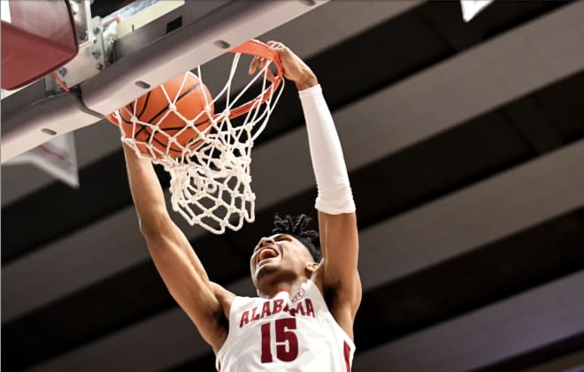 Alabama Crimson Tide forward Jarin Stevenson (15) dunks the ball against the Auburn Tigers at Coleman Coliseum. Photo | Gary Cosby Jr.-USA TODAY Sports