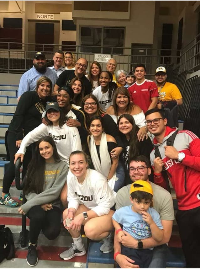 Andrea Fuentes (wearing the black Mizzou hat) with extended family at Mizzou's tournament in Puerto Rico