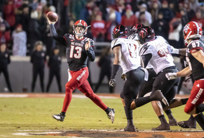 NC State Wolfpack football quarterback Devin Leary throws a pass