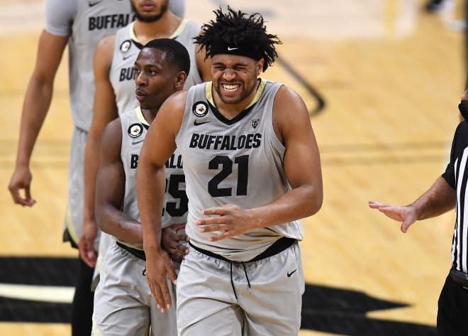 Evan Battey soldiers his way to the free throw line with less than five seconds remaining in the game. Battey, who tweaked his foot moments earlier in a collision with UA's Terrell Brown, toughed it out and sank both of his FTs.