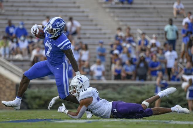 Jordan Waters breaks free of a tackle against Northwestern during last season's game. 