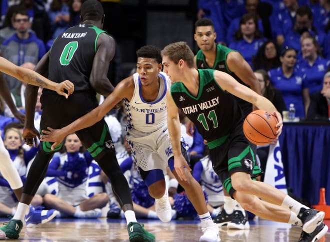 Kentucky freshman guard Quade Green tried to fight his way around a pick by Utah Valley in the Wildcats' opening game of the season.