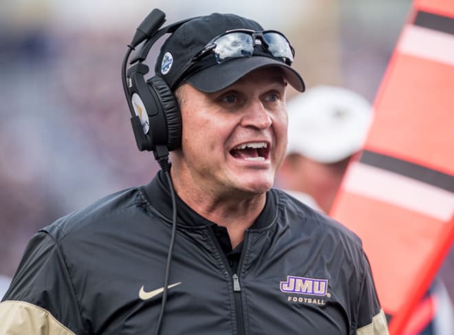 James Madison coach Mike Houston (shown earlier this season) signed a 10-year contract extension on Tuesday.
