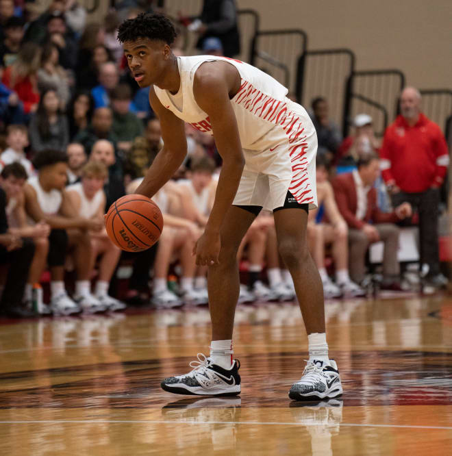 Fishers Tigers guard Jalen Haralson (10) dribbles out the clock Friday, Dec. 16, 2022, at Fishers High School. High School Basketball Hs Basketball Fishers Vs Hamilton Southeastern Hamilton Southeastern Royals At Fishers Tigers