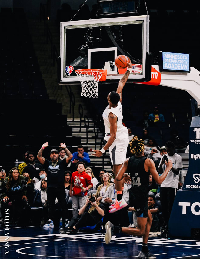 DJ Jefferson goes up for a dunk in a game at Minnesota Prep.