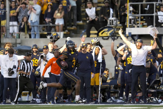 Cornerback Nohl Williams runs back one of two defensive touchdowns for Cal in Saturday's win over Washington State.