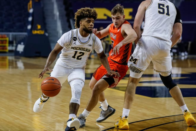 Michigan Wolverines basketball point guard Mike Smith scored 16 points in his U-M debut against Bowling Green.