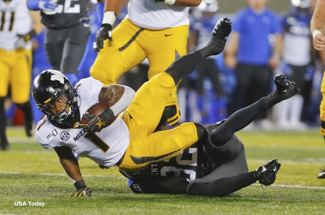 Missouri's offense recorded season lows in points and yards in a 29-7 loss at Kentucky.