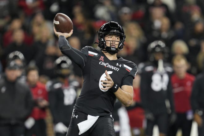 Ben Bryant threw for 2,732 yards, 21 touchdowns and 7 interceptions in 11 games for Cincinnati last year.