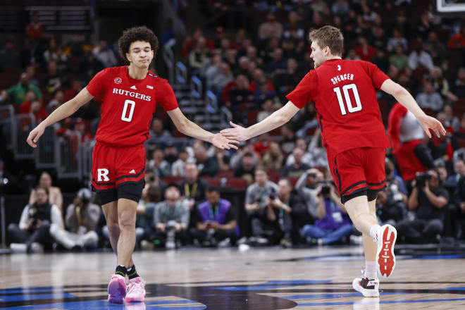 Rutgers Scarlet Knights guard Cam Spencer (10) is congratulated by guard Derek Simpson (0) after scoring against the Purdue Boilermakers during the first half at United Center.