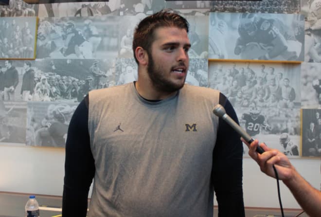 Michigan redshirt junior Jon Runyan Jr. is emerging as a candidate to start at right tackle this fall. 