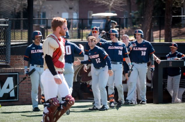 Illinois celebrates a run scored in a game versus Elon in 2020. (Photo: fightingillini.com)