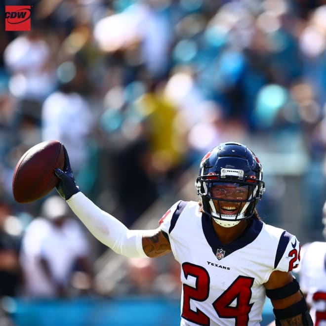 Former LSU and now Houston Texans rookie cornerback Derek Stingley Jr. celebrates the first interception of his pro career in the Texans' 13-6 win over Jacksonville on Sunday. He immediately ran off the field and handed the ball to his father sitting in a front row seat in the stands.