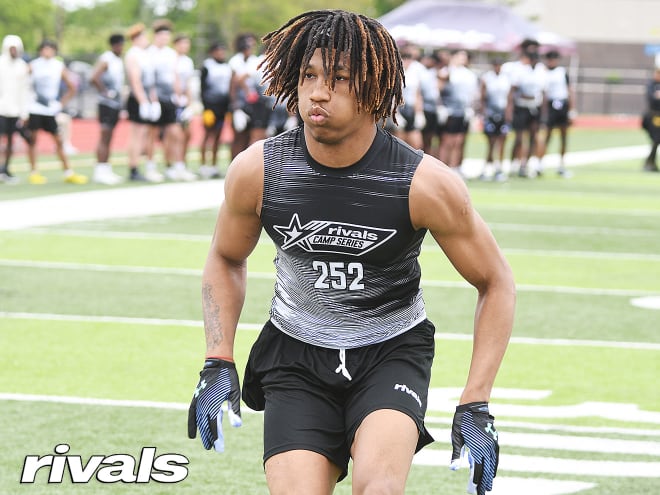 Three-star cornerback Kaj Sanders will visit Wisconsin officially in late May.