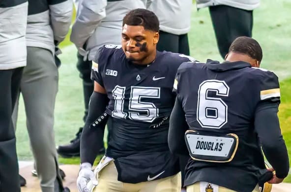 DaMarcus Mitchell figures in prominently to Purdue's defensive plans. But is it at linebacker or end?