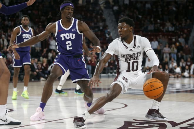 Jan 28, 2023; Starkville, Mississippi, USA; Mississippi State Bulldogs guard Dashawn Davis (10) dribbles as TCU Horned Frogs forward Emanuel Miller (2) defends during the second half at Humphrey Coliseum.