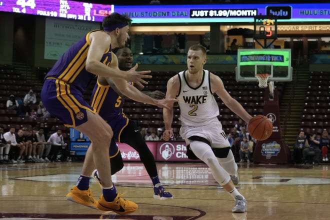 Wake Forest's Cameron Hildreth turns the corner looking to make a move against LSU. 