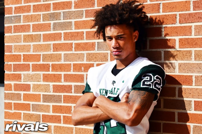Texas safety JD Coffey holds a Michigan offer. 